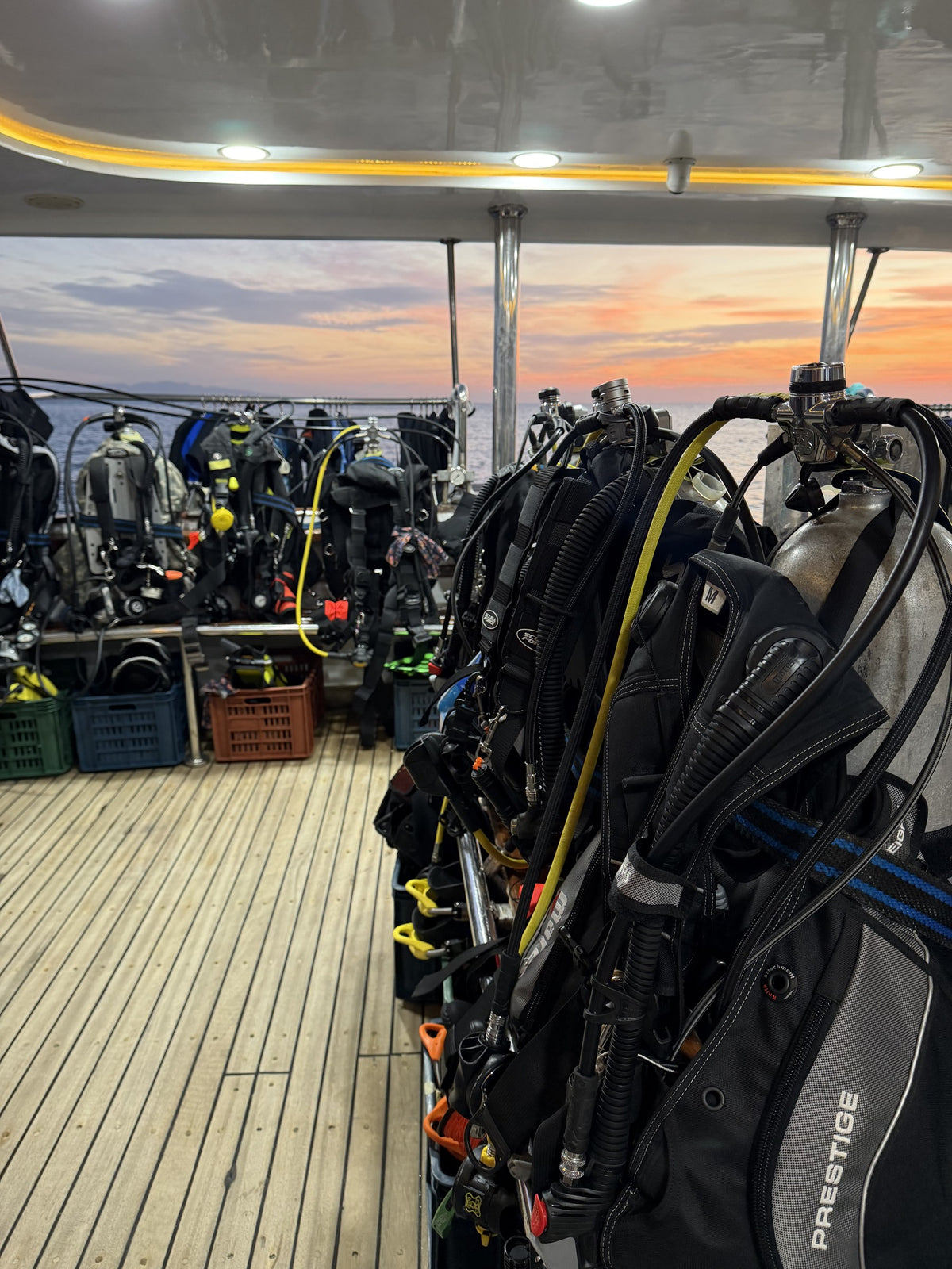 Diving equipment on deck at sunset aboard Emperor Superior
