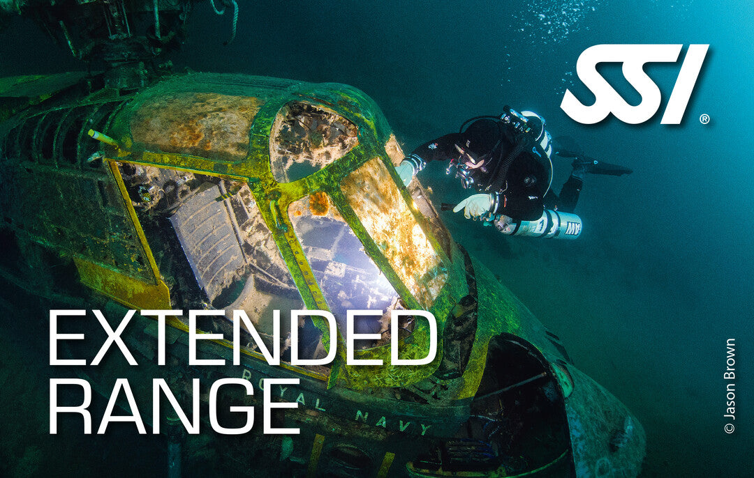 SSI Extended Range artwork showing a technical diver beside a submerged helicopter, photograph by Jason Brown