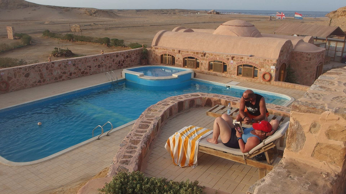 The swimming pool and sun terrace at Roots Red Sea