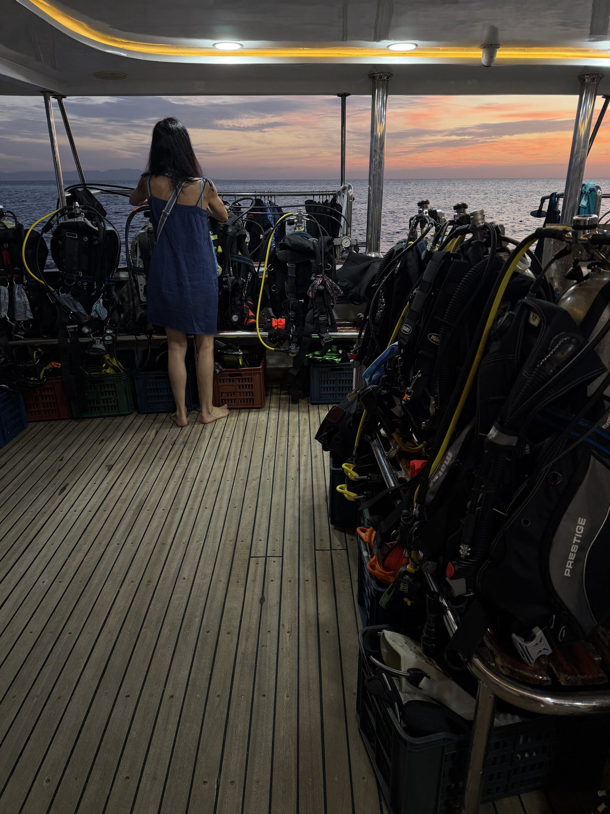 Life on the dive deck at sunset